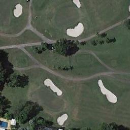 Figure of a golf course with many bunkers.